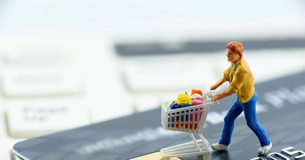 claymation man pushing a shopping cart