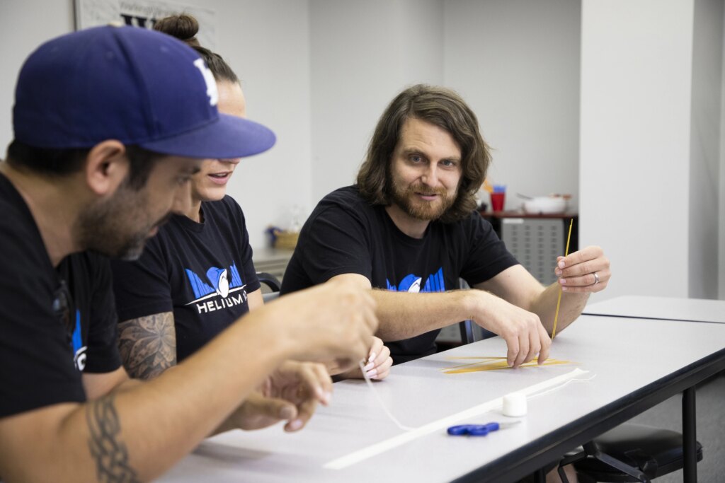 vhelium 10 member at volunteer event