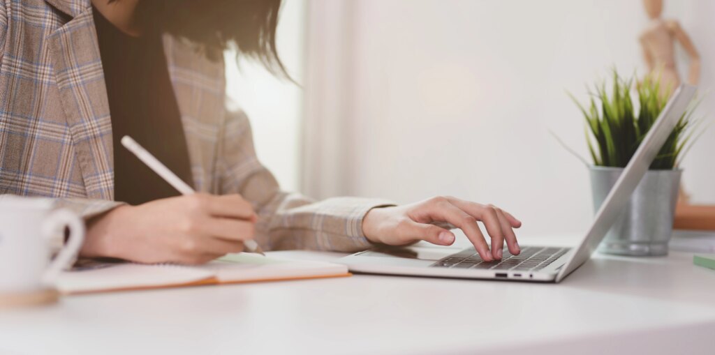 Woman researching on laptop