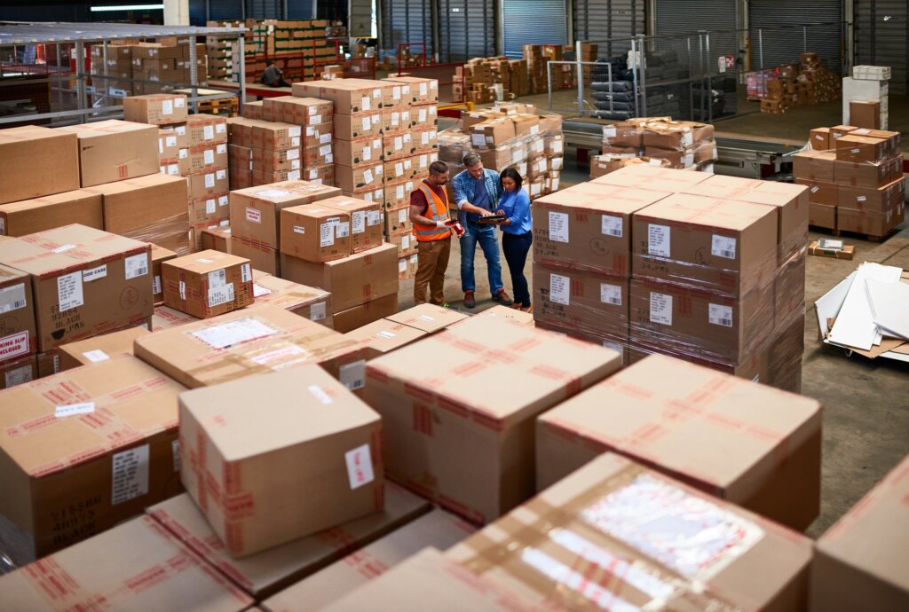 people working in a shipment warehouse