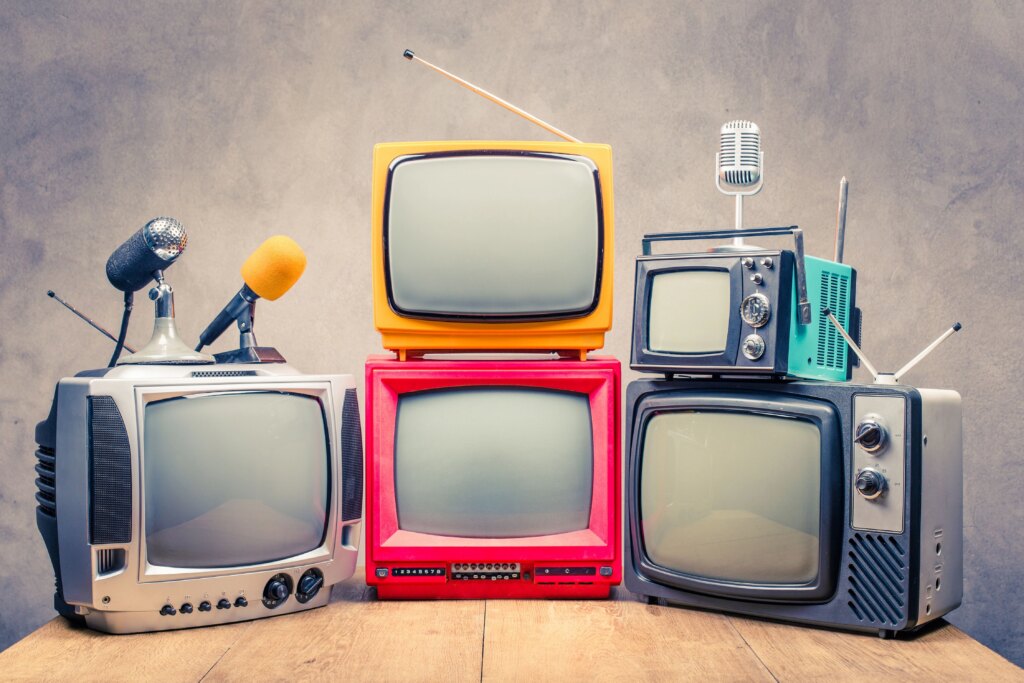 a bunch of tvs and mics