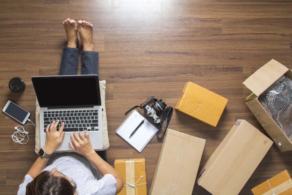 woman working on her amazon fba shipments online