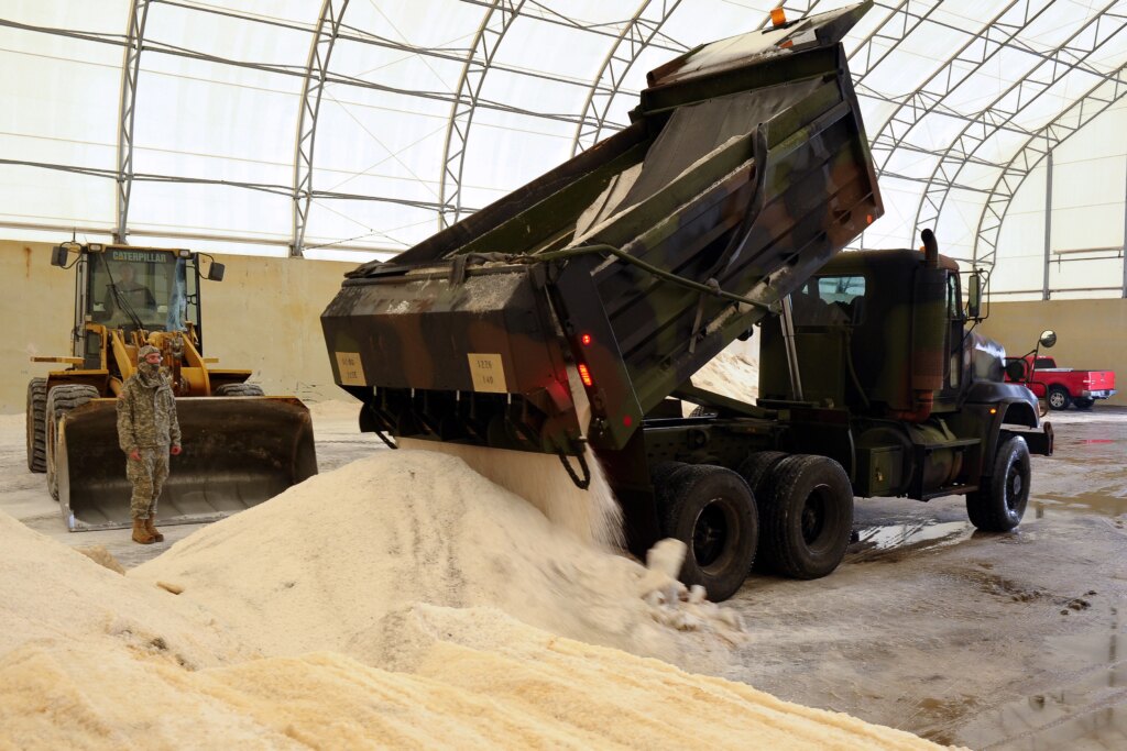 dump truck dumping sand