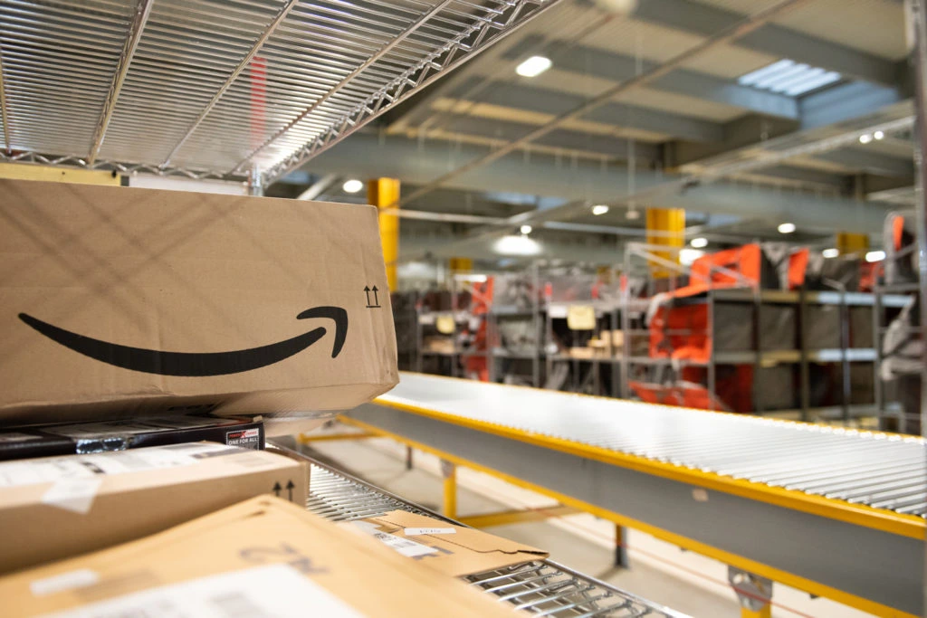 amazon packages on a conveyor belt