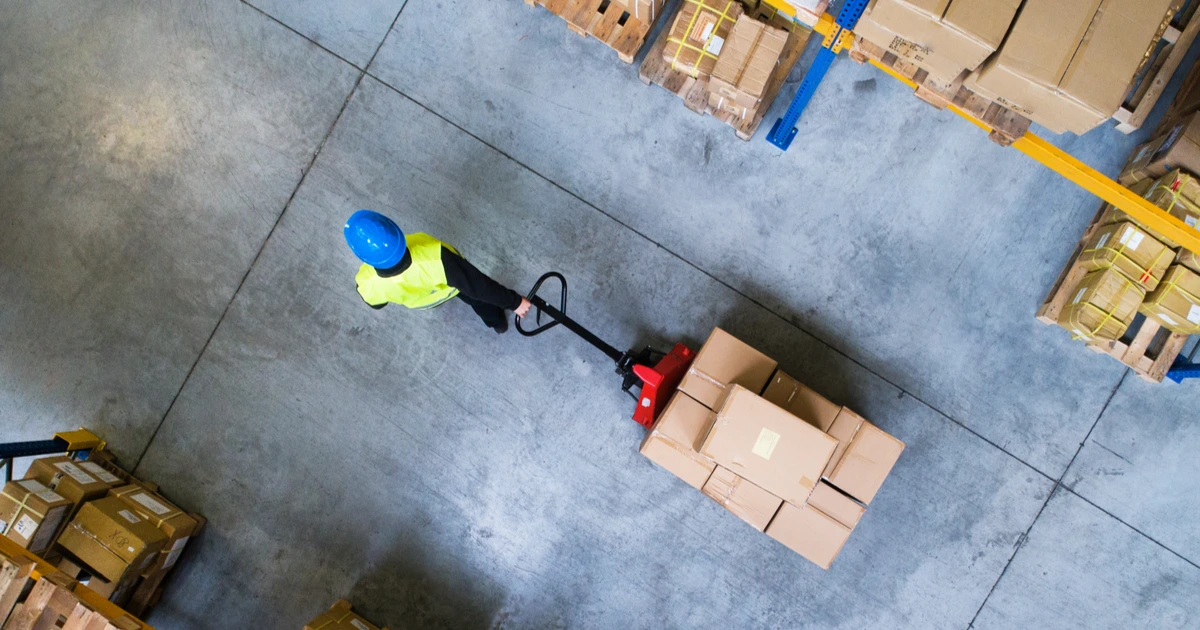 Man loading Amazon Fulfillment Order in Warehouse