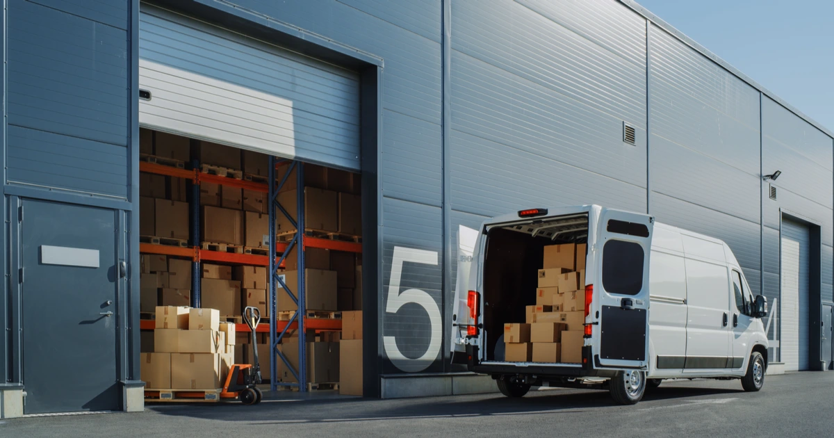 van outside of amazon storage facility